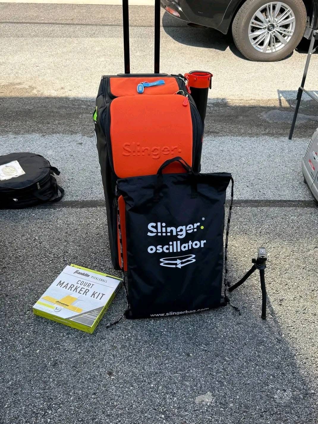 Slinger pickleball machine + accessories